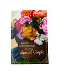 Greeting card with flowers and 'Happy Anniversary to a Very Special Couple' text on a white background