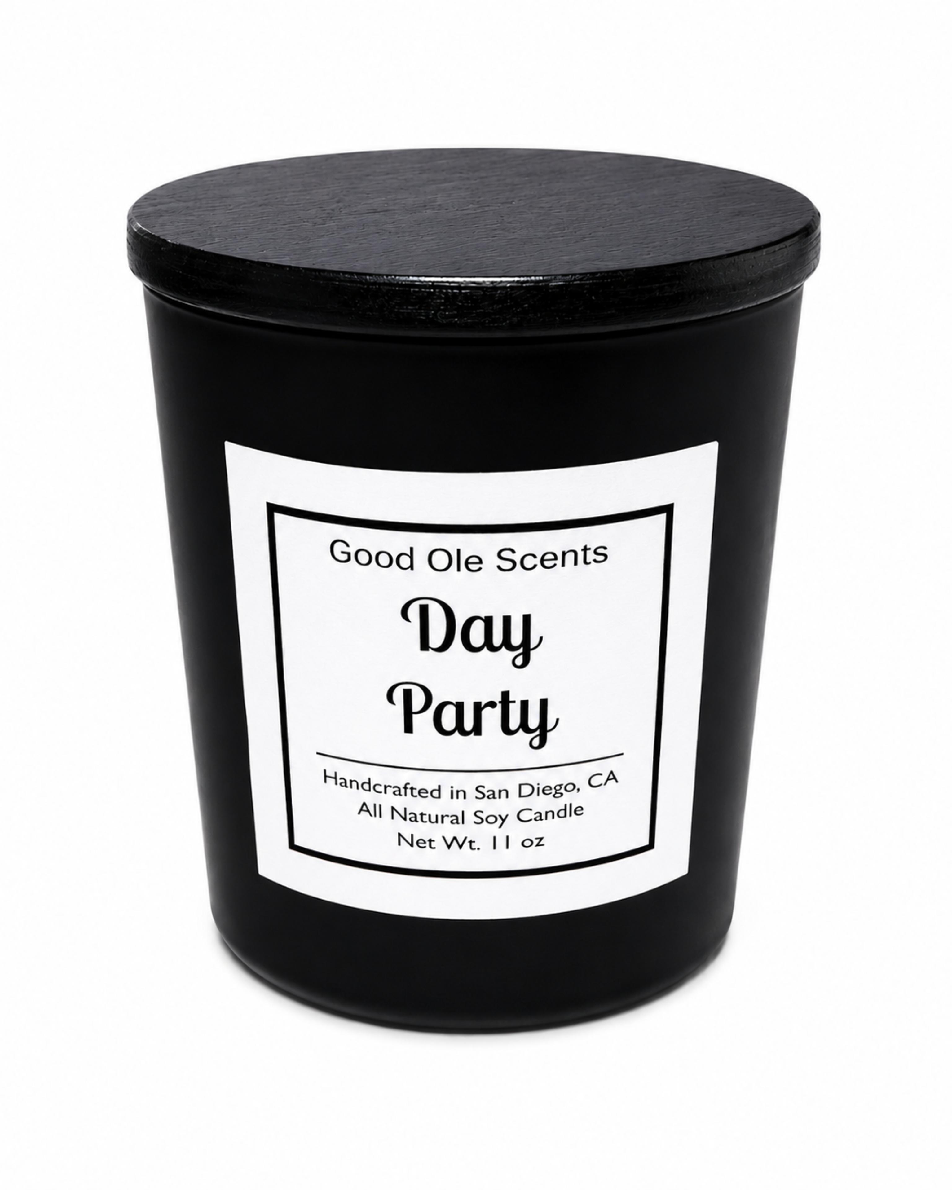Black candle with a white label on a white background