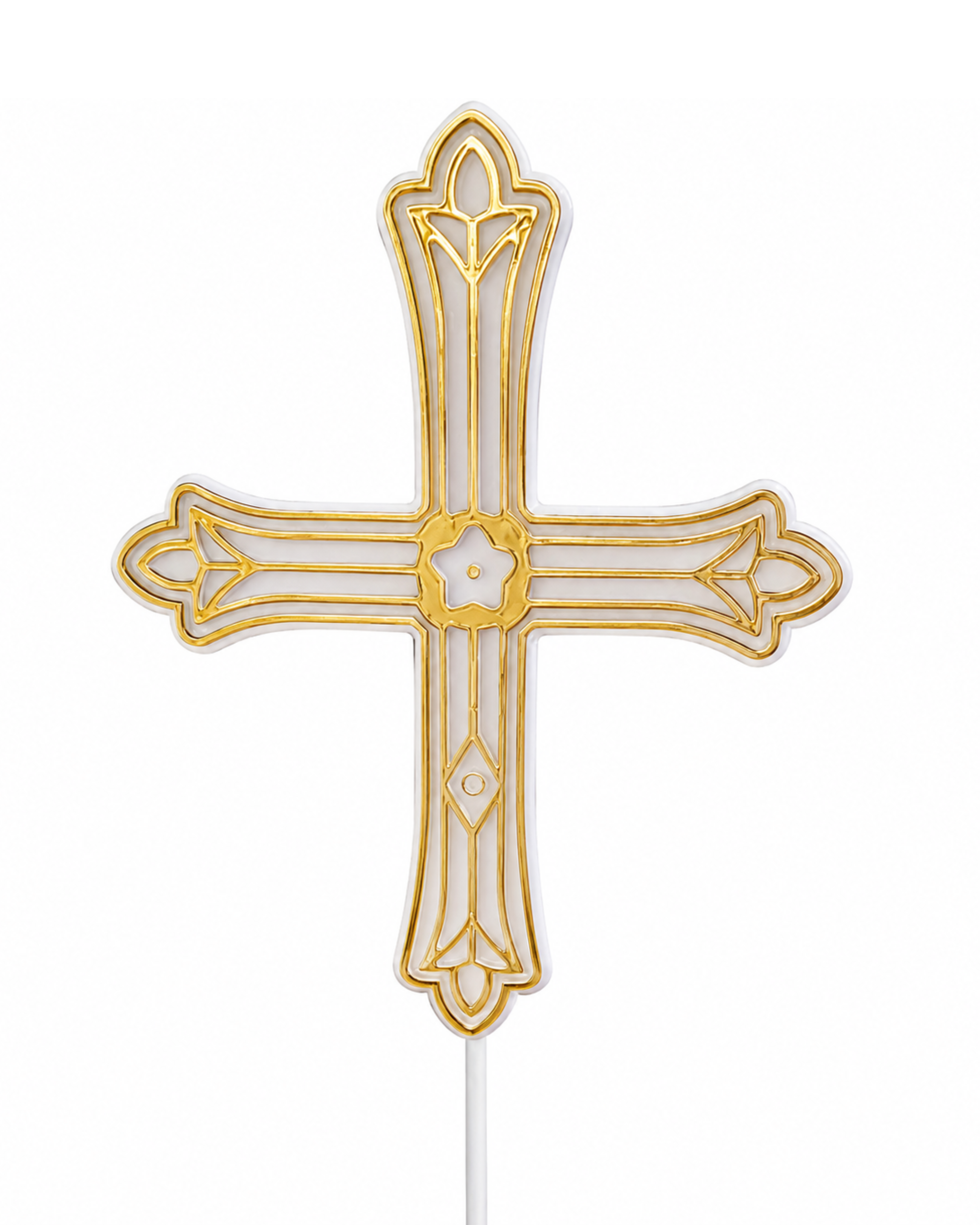 Decorative cross with gold and white design on a white background