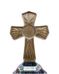 Decorative cross with intricate design on a white background