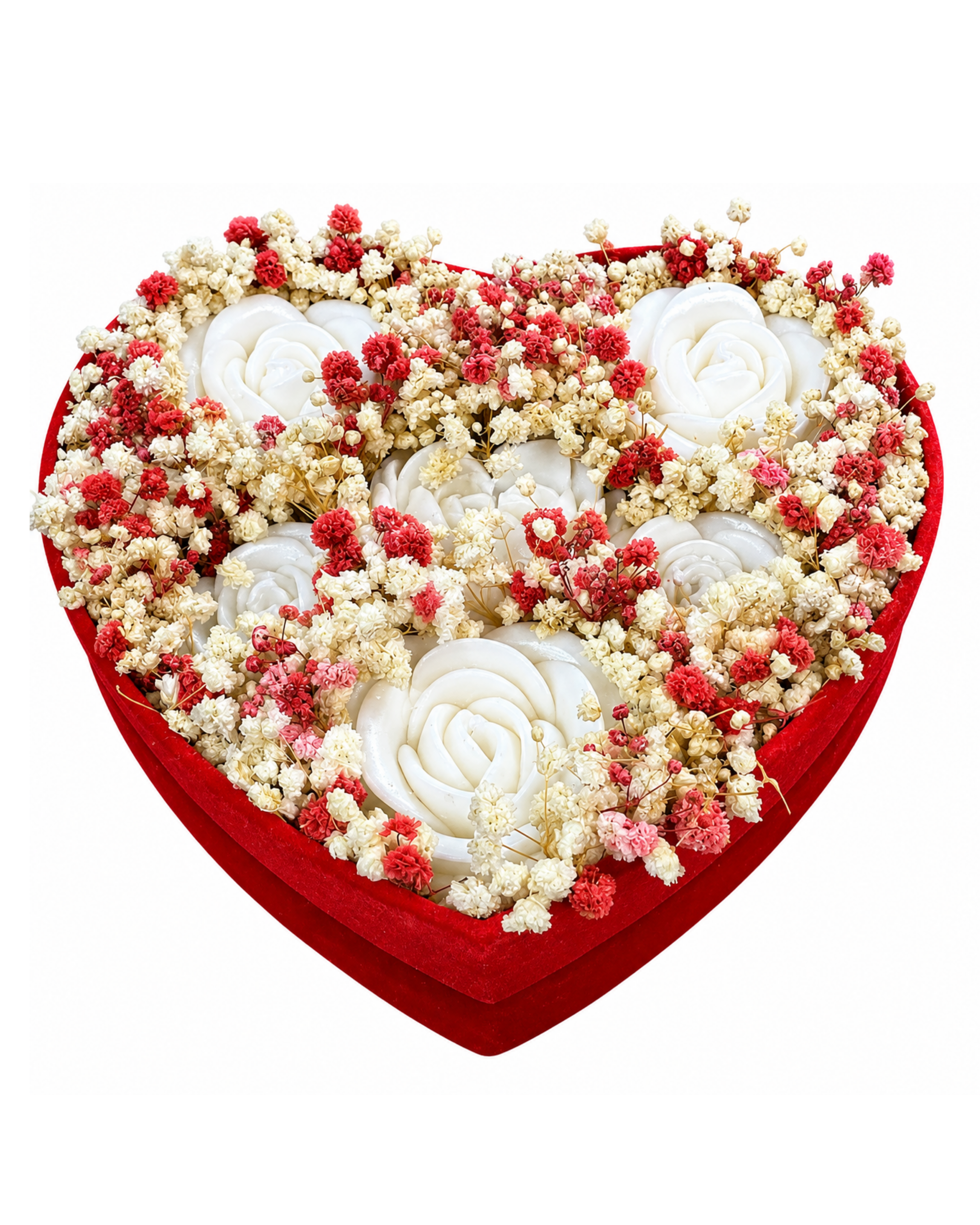 Heart-shaped flower arrangement with red, white, and beige flowers on a white background