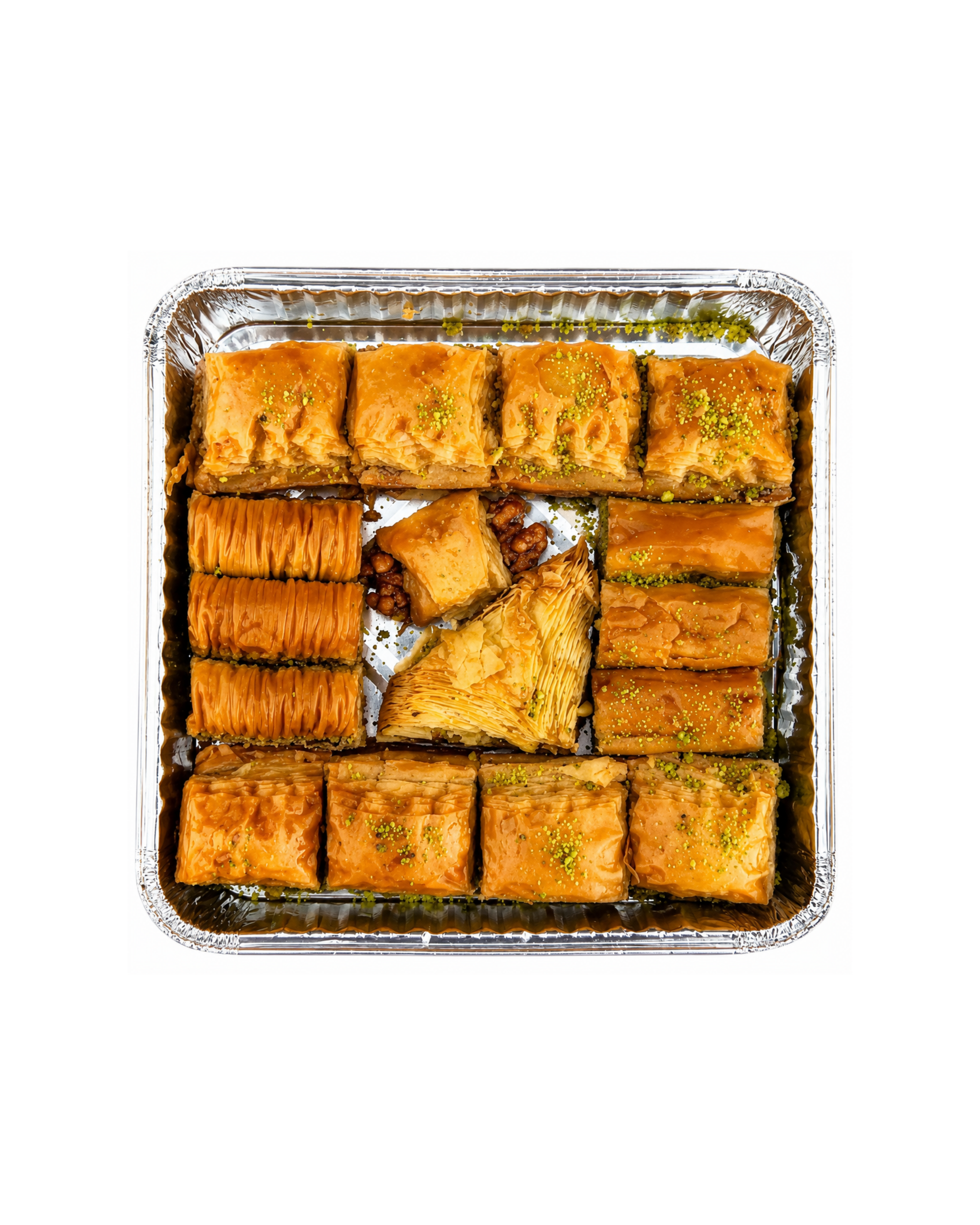 Baklava in a metal tray on a white background