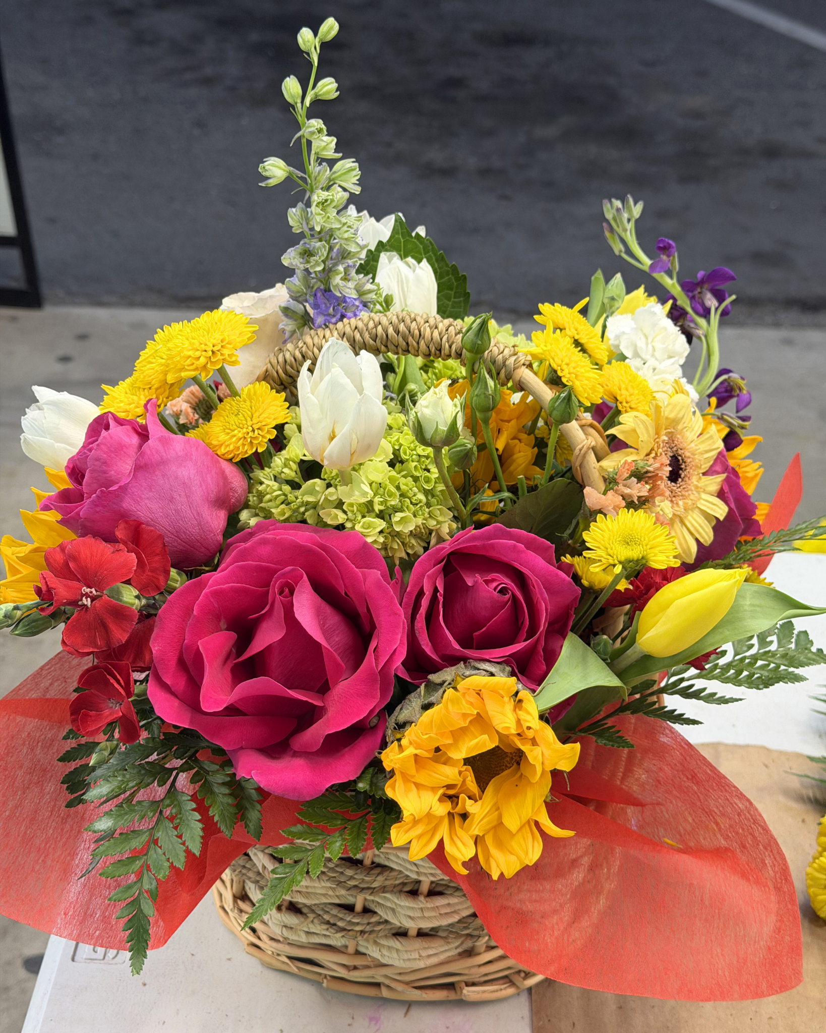 Rainbow Mixed Flower Basket Arrangement - Landen’s Flowers