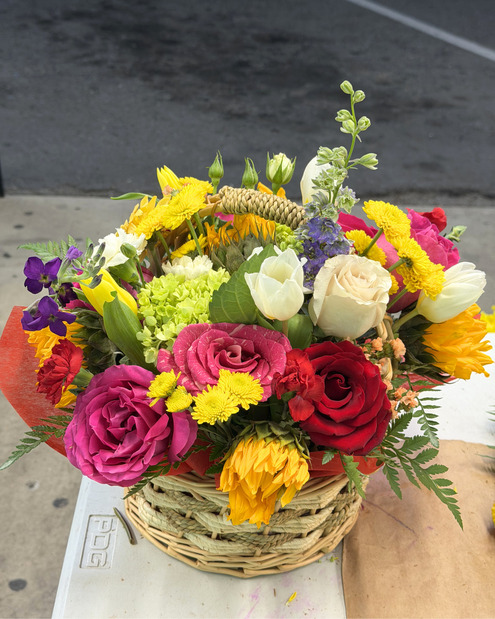 Rainbow Mixed Flower Basket Arrangement - Landen’s Flowers