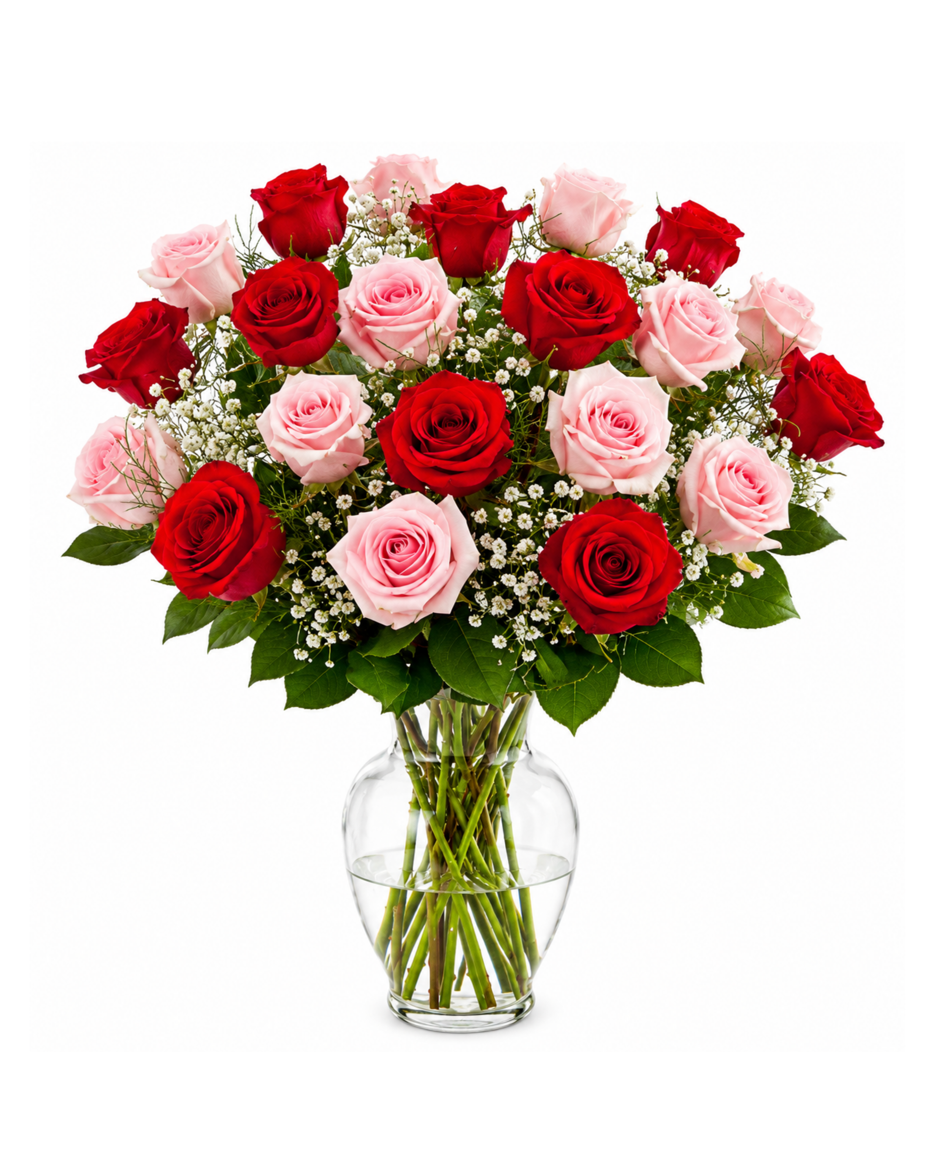 Bouquet of red and pink roses in a clear vase on a white background