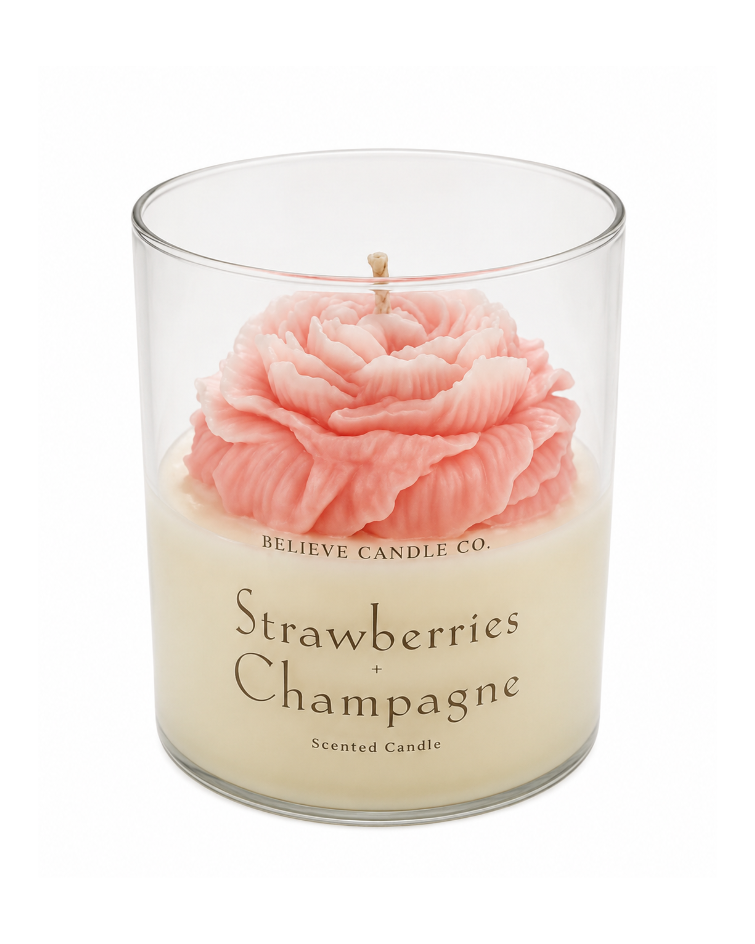 Candle with a pink rose design and 'Believe Candle Co.' branding on a white background