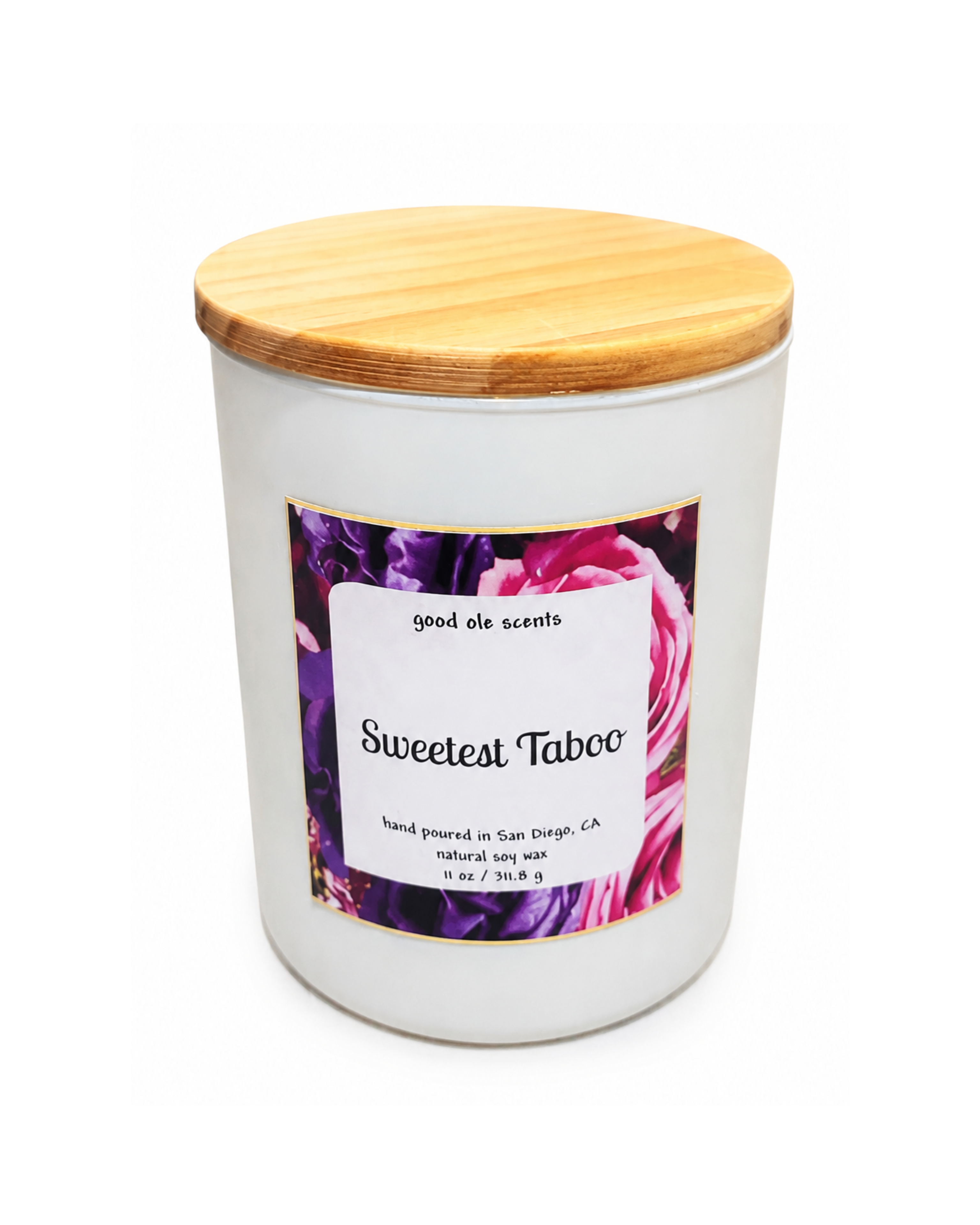 Candle with a wooden lid and 'Sweetest Taboo' label on a white background