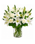 Bouquet of white lilies and roses in a clear vase on a white background