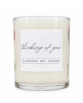 Lavender soy candle with a 'thinking of you' label on a white background