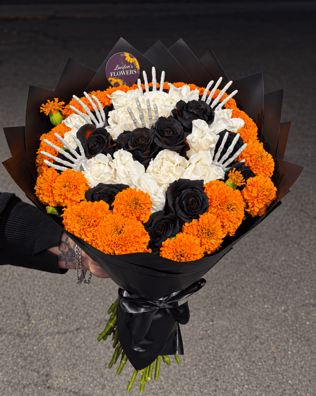 Halloween Marigold & Black Rose Bouquet with Skeleton Hands - Landen’s Flowers