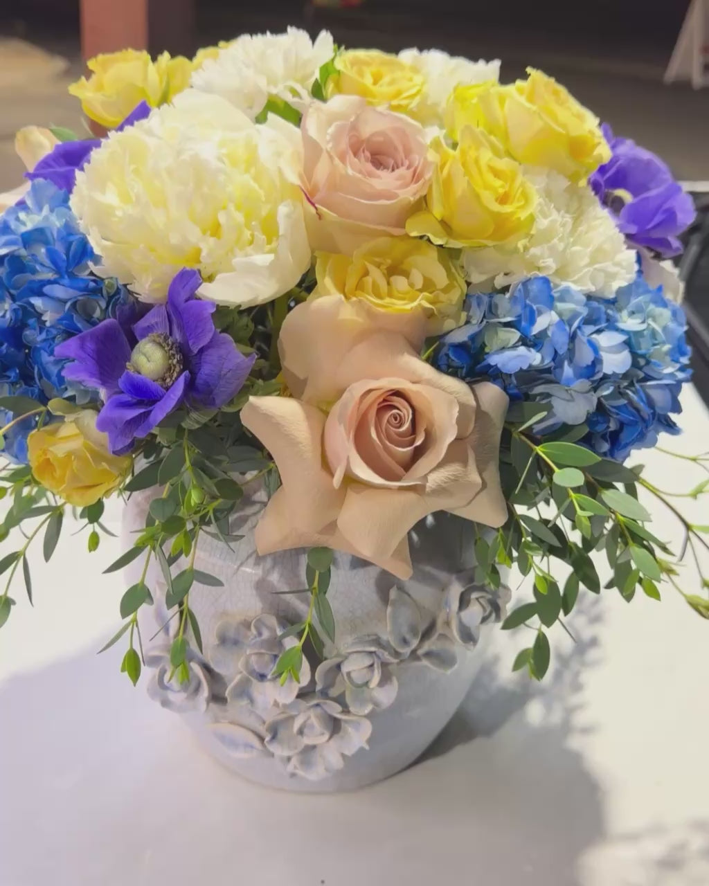 Blue Hydrangea & Peach Rose Arrangement in Decorative Ceramic Vase